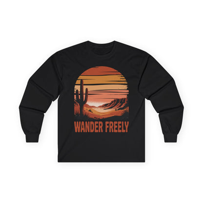 TEEZOCA wander freely cactus and sunset artwork on unisex long-sleeve t-shirt Black long-sleeve shirt with a desert landscape graphic and 'Wander Freely' text on a white background