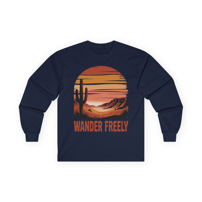 TEEZOCA wander freely desert sunset design on unisex long-sleeve t-shirt Navy blue long-sleeve shirt with a desert landscape graphic and 'Wander Freely' text on a white background