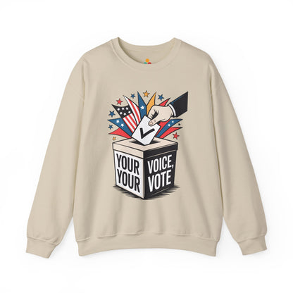 TEEZOCA your voice your vote sweatshirt with ballot box graphic design Beige sweatshirt with a graphic of a hand placing a ballot in a box labeled 'Your Voice, Your Vote' on a white background.