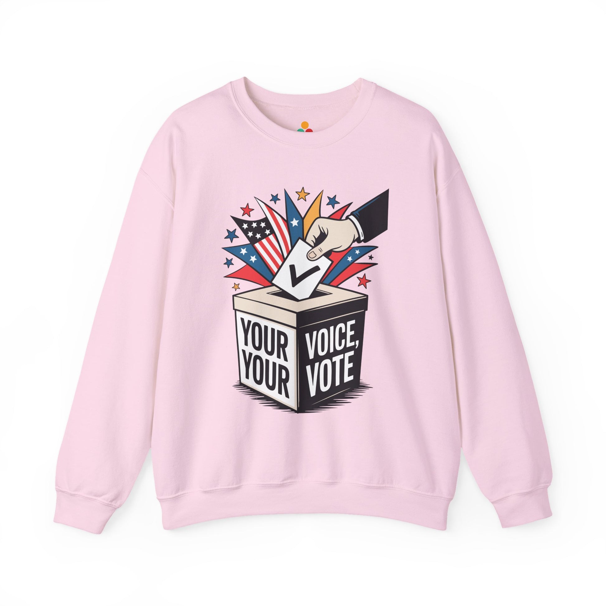 TEEZOCA your voice your vote sweatshirt with ballot box graphic design Pink sweatshirt with a graphic design of a hand placing a ballot in a box labeled 'Your Voice, Your Vote' on a white background.