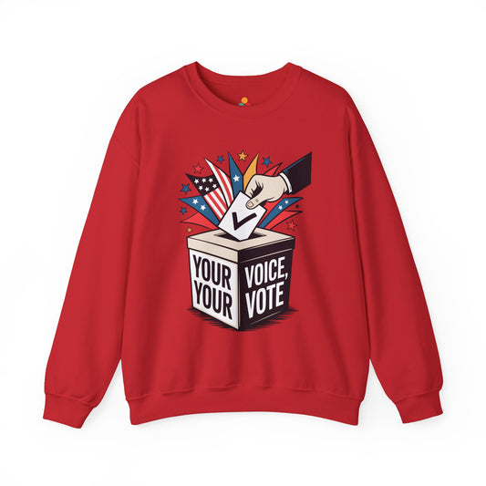 TEEZOCA your voice your vote sweatshirt with ballot box graphic design Red sweatshirt with a graphic of a hand placing a ballot in a box labeled 'Your Voice, Your Vote' on a white background.