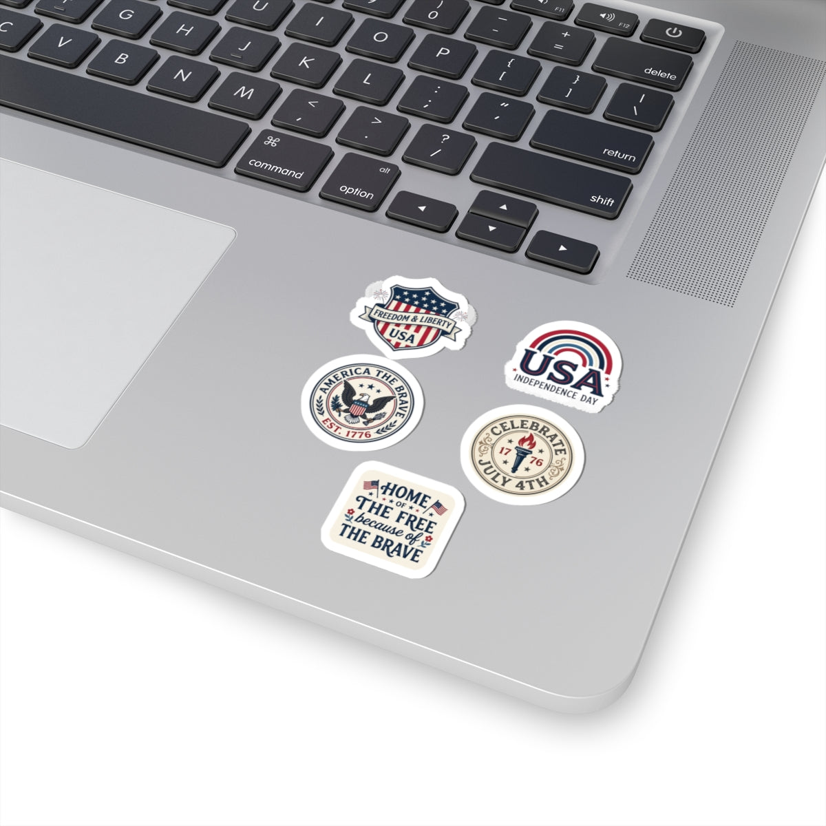 Vintage Americana Sticker Set – Retro 4th of July Patriotic Gift | A secondary angle view of the grey laptop showcasing TEEZOCA retro freedom sticker collection.