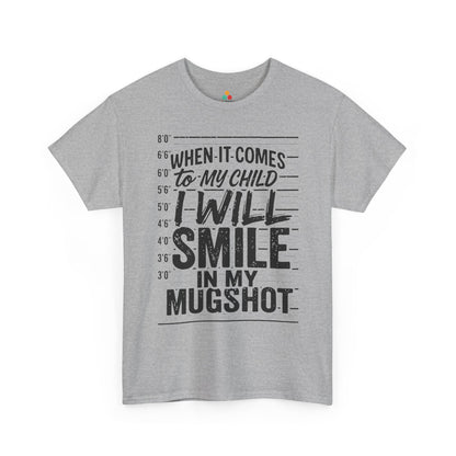 When It Comes To My Child I Will Smile In My Mugshot Funny Parental Humor T-Shirt | TEEZOCA strong parent statement Unisex T-shirt with distressed lettering design