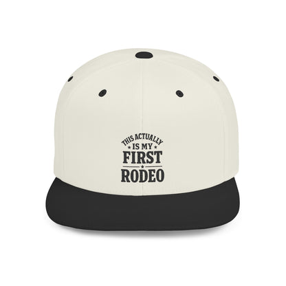 White and black cap with text 'This actually is my first rodeo' on a white background