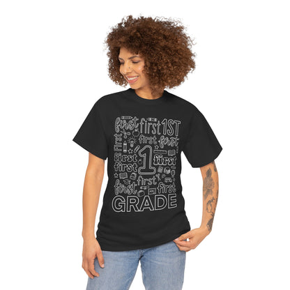 Woman first grade teacher wearing a black TEEZOCA typography t-shirt reading first grade, a cute back to school tee for teachers.
