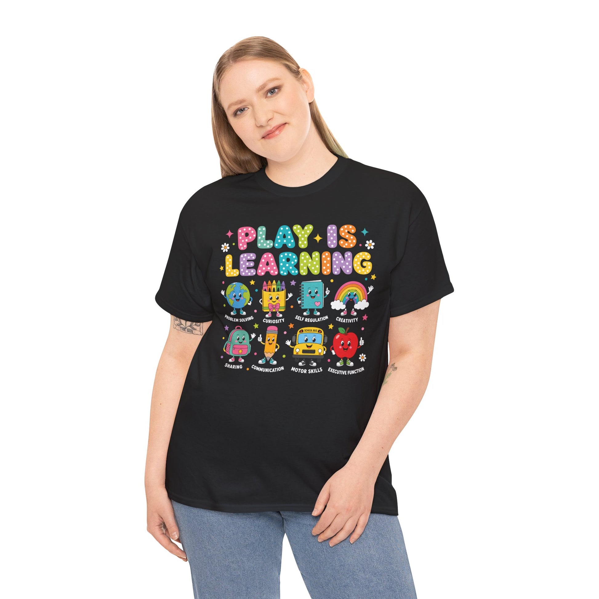 Woman teacher wearing a black TEEZOCA Play Is Learning t-shirt, a cute back to school tee for early-childhood educators.
