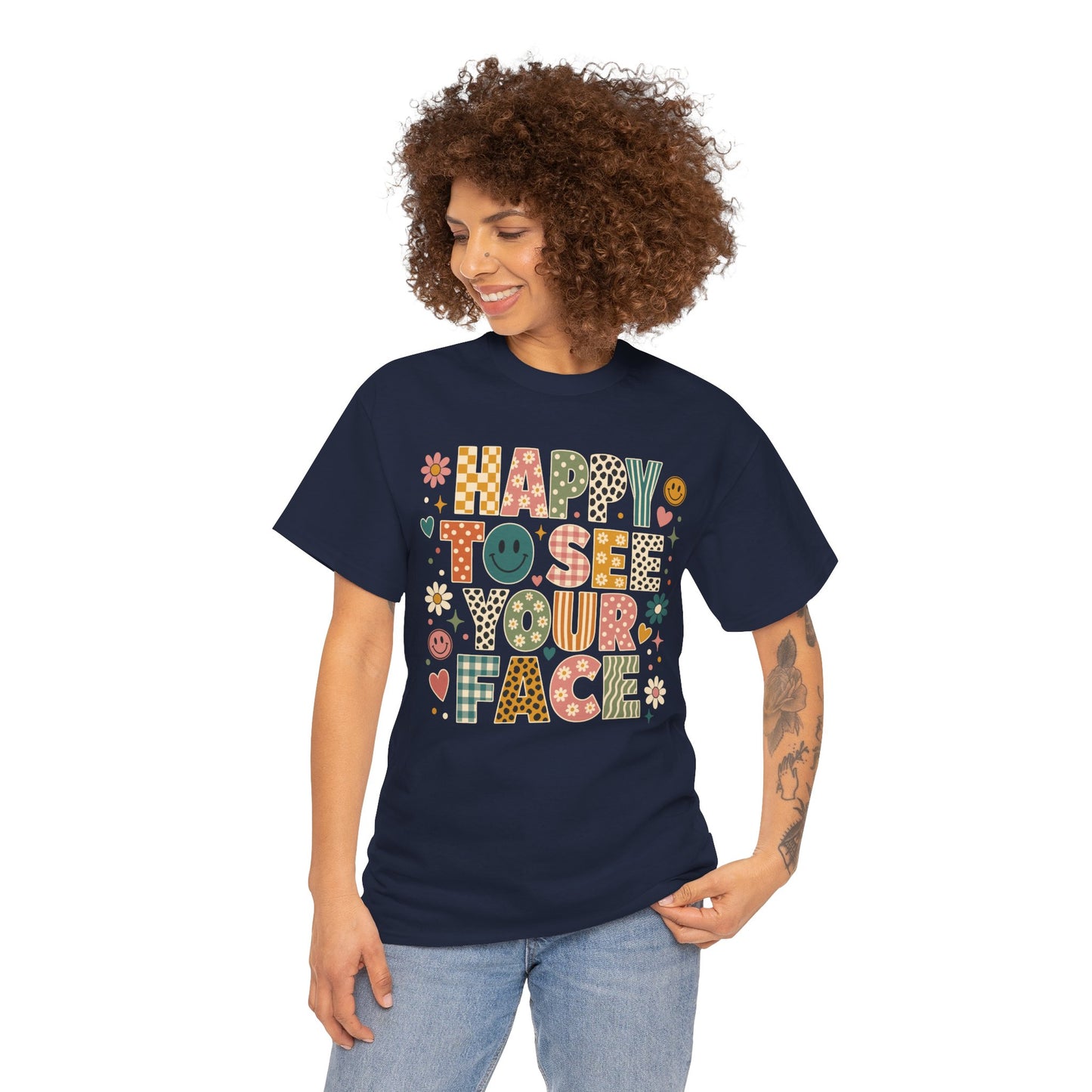 Woman teacher wearing a navy TEEZOCA Happy to See Your Face boho t-shirt, a cute retro back to school tee for teachers.
