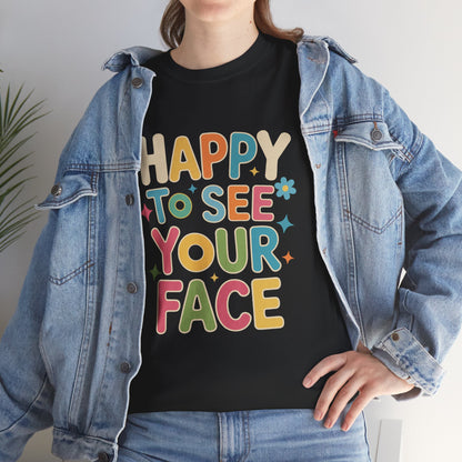 Woman wearing TEEZOCA black “Happy To See Your Face” school shirt under denim jacket.