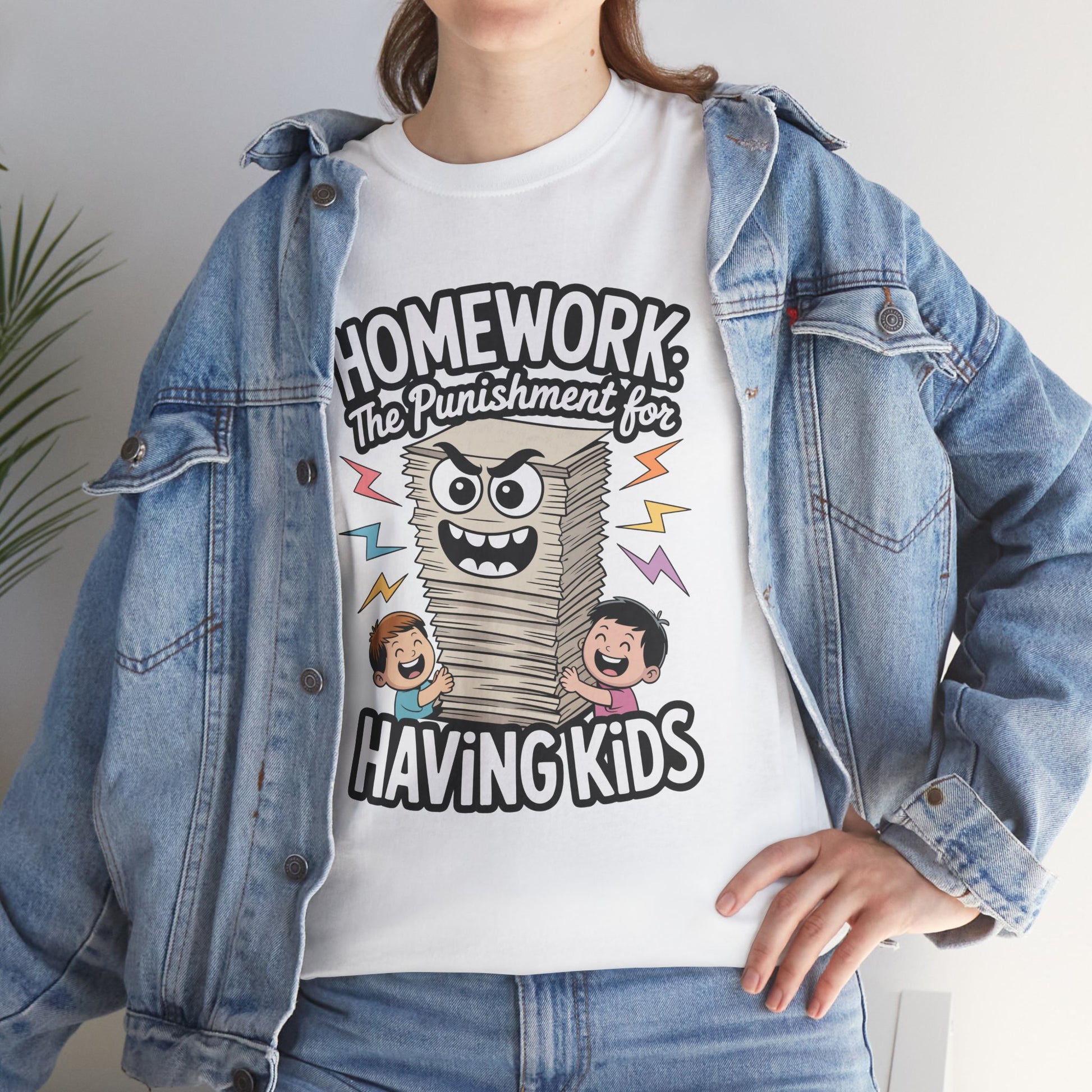 Woman wearing TEEZOCA white homework dad joke tee under denim jacket.