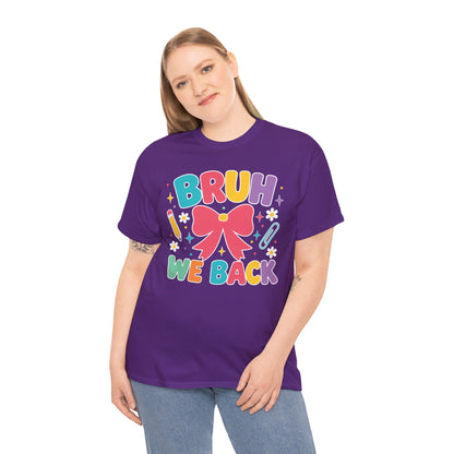 Woman wearing a purple TEEZOCA Bruh We Back coquette t-shirt with a bow, a cute funny back to school tee.
