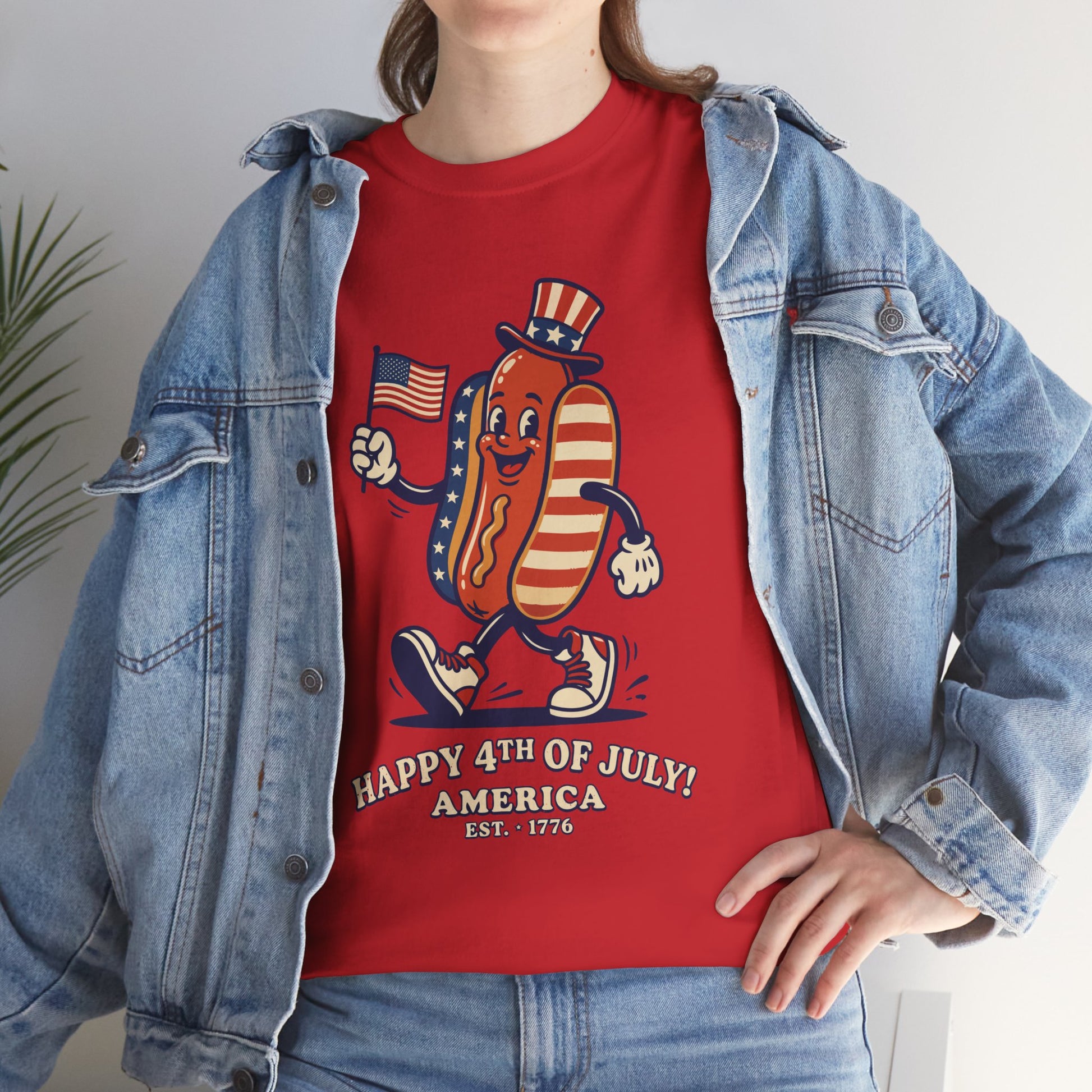 Woman wearing a red TEEZOCA Happy 4th of July Cartoon Hot Dog T-Shirt – Funny Patriotic Gift for Men and Women