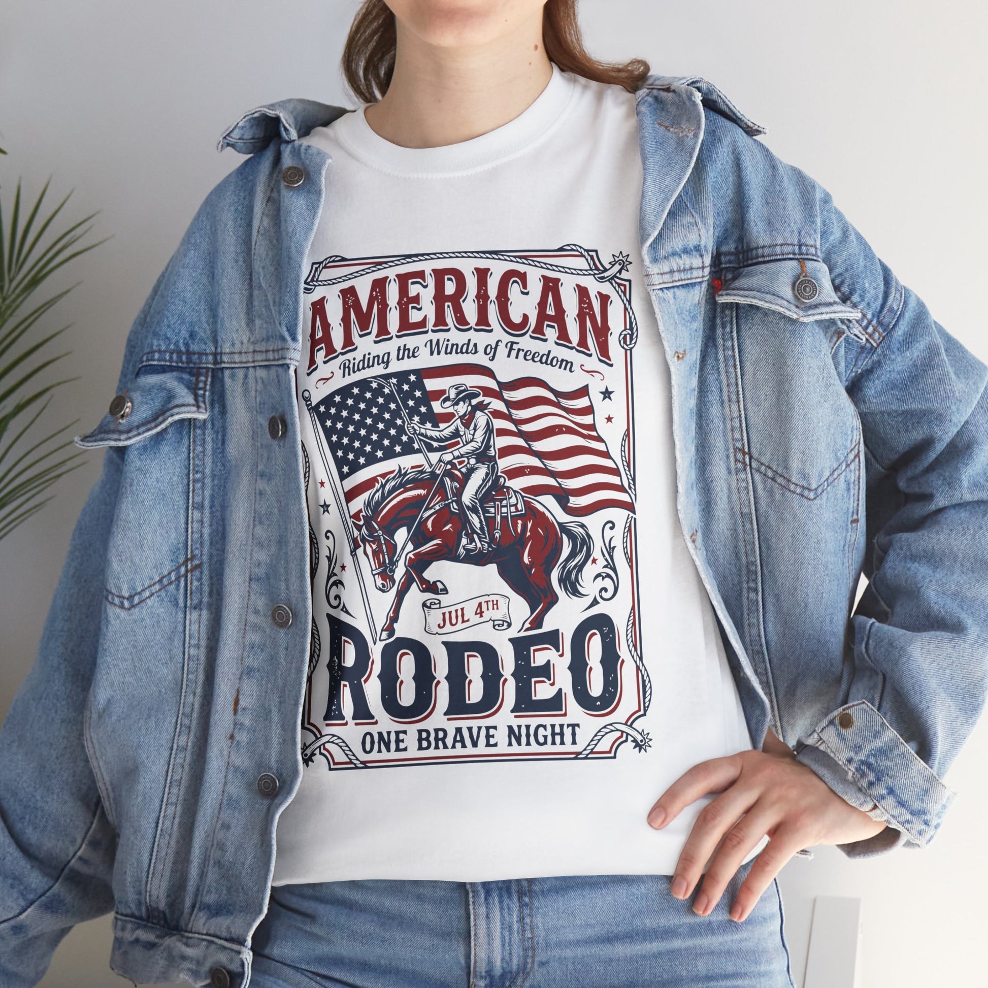 Woman wearing a white TEEZOCA vintage cowboy rodeo shirt styled underneath a blue denim jacket.