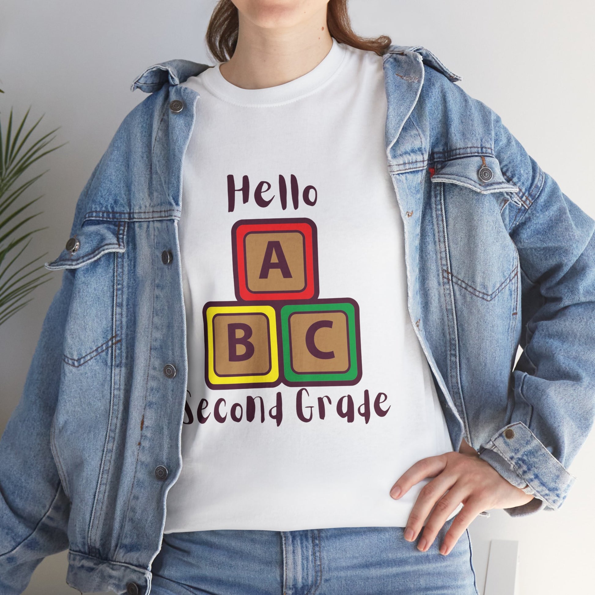 Woman wearng  Hello Second Grade ABC Blocks White T-Shirt – Back to School Teacher Gift TEEZOCA