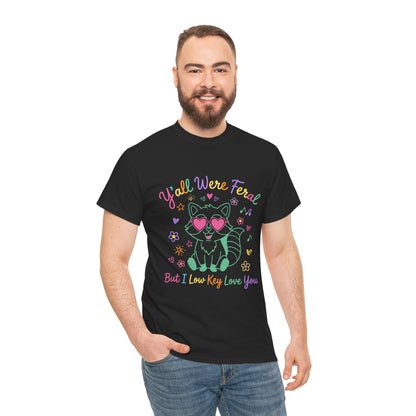 Y'all Were Feral But I Low Key Love You Raccoon T-Shirt – Funny Teacher End of Year Gift | TEEZOCA t-shirt featuring Y'all Were Feral But I Low Key Love You artwork with a colorful raccoon teacher graphic.
