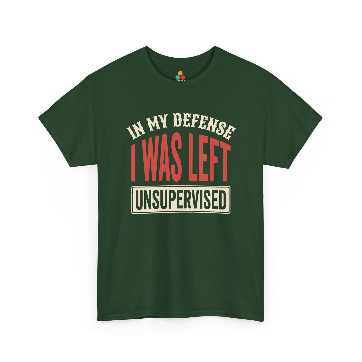 a Forest Green T-shirt featuring the phrase “In My Defense I Was Left Unsupervised” in bold red and cream retro-style text, funny sarcastic quote shirt, witty statement tee, dry humor graphic tee, adult humor apparel, retro typography shirt, bold statement shirt, playful sarcasm tee, humorous quote t-shirt, chaos humor shirt, and funny novelty graphic tee.

