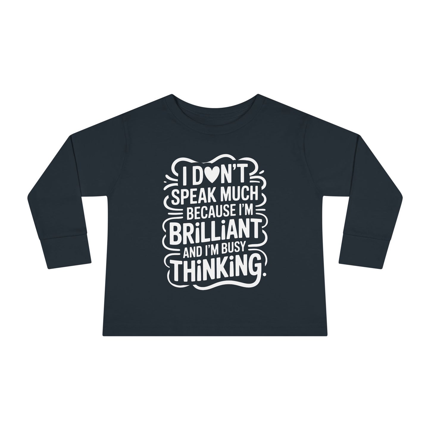 Black toddler long sleeve tee featuring autism acceptance message “I don’t speak much because I’m brilliant and I’m busy thinking” in white lettering.