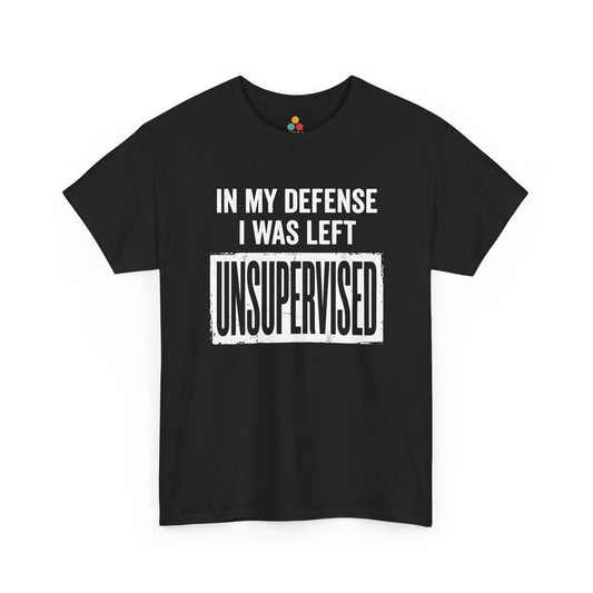  black T-shirt featuring bold white block typography reading "In My Defense I Was Left Unsupervised" with a highlighted "UNSUPERVISED" text box, funny sarcastic quote shirt, witty statement tee, dry humor graphic tee, and bold novelty quote apparel.