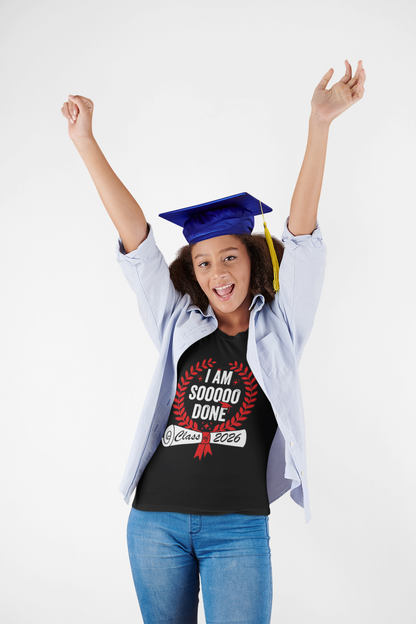  Excited female graduate raising her arms in the “I Am Soooo Done – Class 2026” t-shirt and cap, celebrating senior year and diploma.