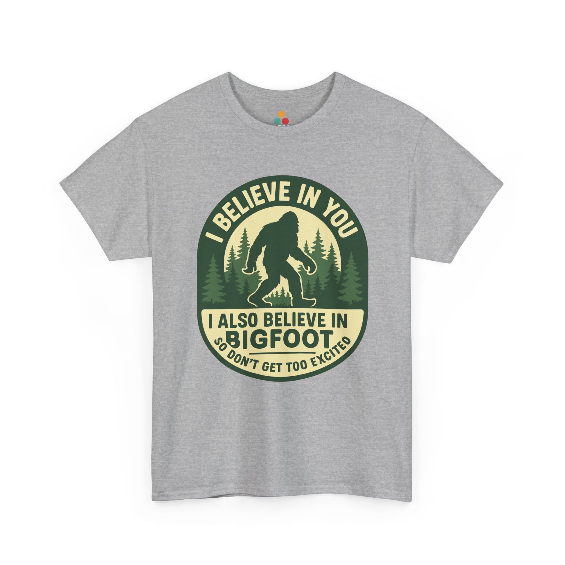  “Teezoca heather gray I Believe In You Bigfoot shirt, funny forest badge cryptid tee, front view”

