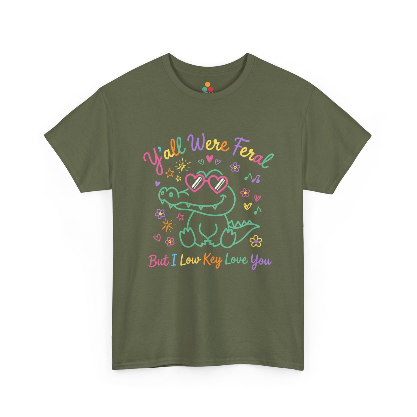 t-shirt with crocodile wearing heart-shaped sunglasses surrounded by colorful stars and flowers, with rainbow text reading "Y'all Were Feral But I Low Key Love You" — a funny last day of school teacher gift shirt.

