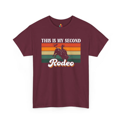 Maroon t-shirt with a graphic of a cowboy on a horse and text 'This is my second Rodeo' on a white background