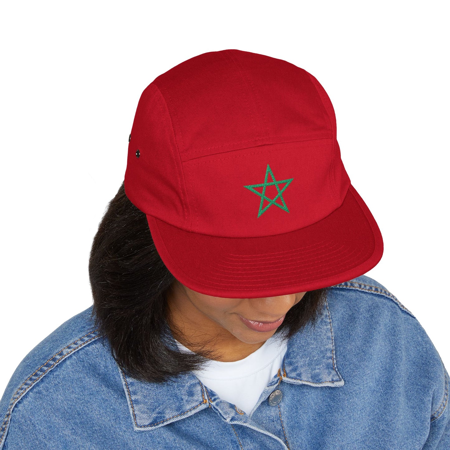 woman wearing a red TEEZOCA 5 panel match day cap and a blue denim jacket.