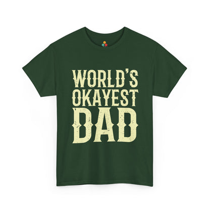  Forest green “WORLD’S OKAYEST DAD” T‑shirt with large cream lettering, flat front mockup.